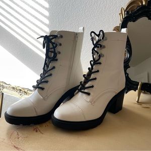 White and black combat boots